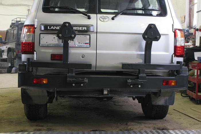 Задний силовой бампер РИФ для Toyota Land Cruiser 105 с 2-мя калитками, фаркоп